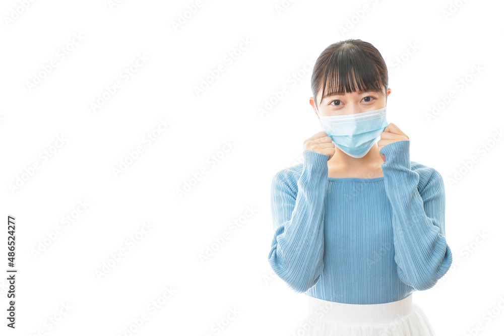 マスクをつけた若い女性 マスクをつけた若い女性
