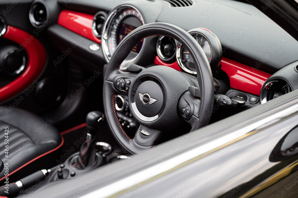 Mini Copper Inside Inside a Mini Cooper car with dashboard, streeing wheel, decorated with ...
