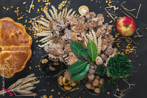 Badnjak or Yule log Serbian Christmas Tree and   traditional food on Orthodox Christmas Eve. Top view, blank space