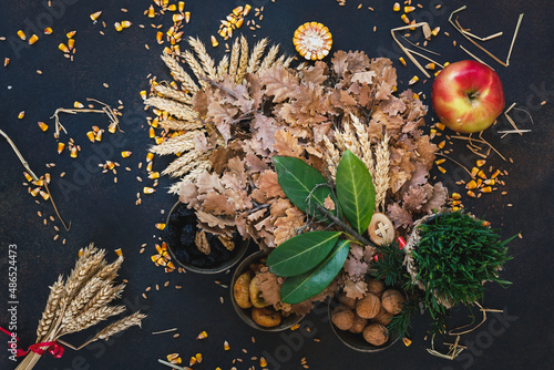 Badnjak or Yule log Serbian Christmas Tree and   traditional food on Orthodox Christmas Eve. Top view, blank space