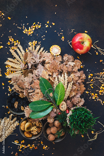 Badnjak or Yule-log, grain and straw, Serbian Christmas. Top view, blank space photo