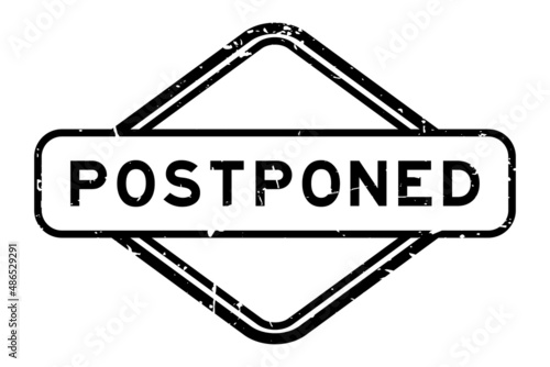 Grunge black postponed word rubber seal stamp on white background