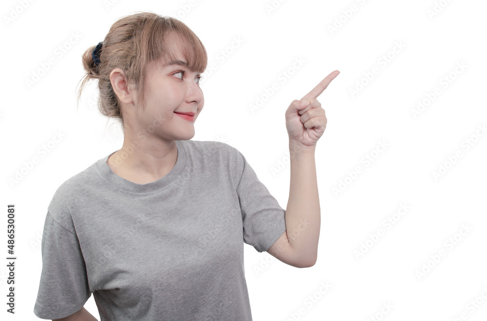 beautiful young asian woman in casual t-shirt pointing finger on upper left side with smile face beautiful young asian woman in casual t-shirt pointing finger on upper left side with smile face