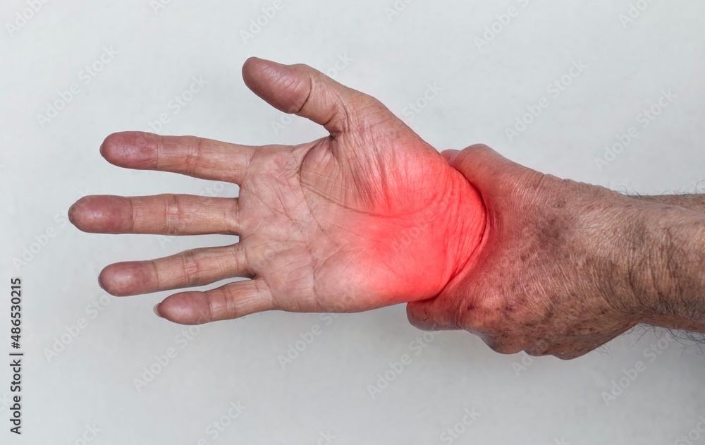 Pain in wrist joint of Asian elder man. Concept of hand pain, osteoarthritis and arm problems. Pain in wrist joint of Asian elder man. Concept of hand pain, osteoarthritis and arm problems.