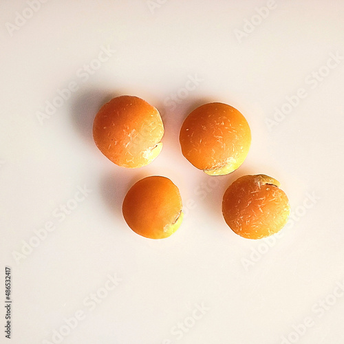 Macro shot of Masur Lentils on white background. photo