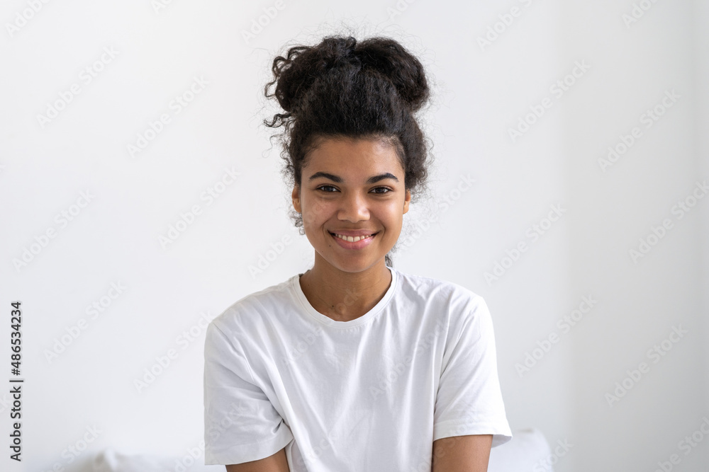 Smiling african american girl looking at camera Smiling african american girl looking at camera