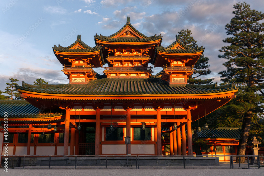 Heian-jingu Shrine, a Shinto shrine located in Sakyō-ku, Kyoto, Japan. The Tori at the entrance is one of the biggest in Japan. Heian-jingu Shrine, a Shinto shrine located in Sakyō-ku, Kyoto, Japan. The Tori at the entrance is one of the biggest in Japan.