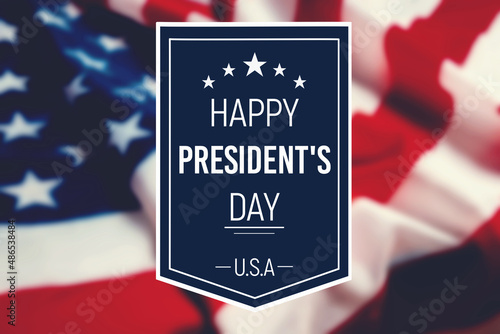 National holidays of United States of America. Happy president's day on blurred background with waving flag of the USA. Concept of patriotism photo