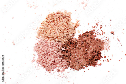 Beauty swatches. Scattered eye shadow isolated on a white background. macro