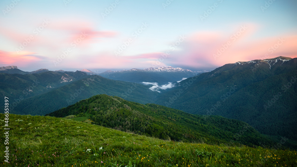 Fototapeta premium Landscape panorama of the mountains and forests in the dark. Long exposure at sunset - blue hour 