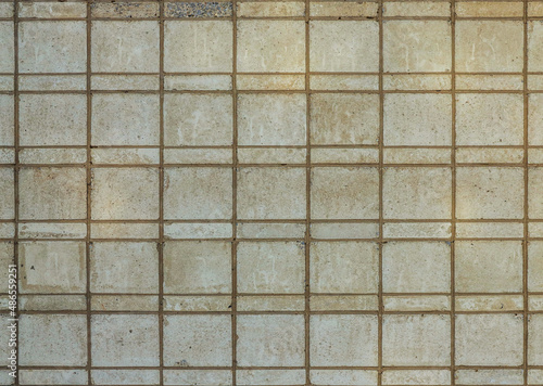 Old white quadratic brick wall - close up. Texture