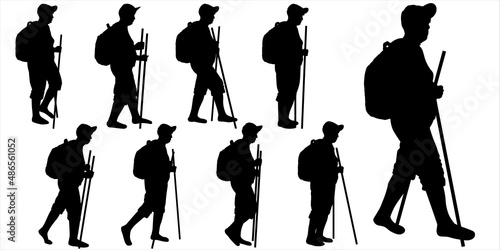 The elderly woman walks. Woman on the move. Hiking. A tourist with a backpack on her back and walking sticks in her hand. Side view, profile. Black female silhouettes isolated on white background.	