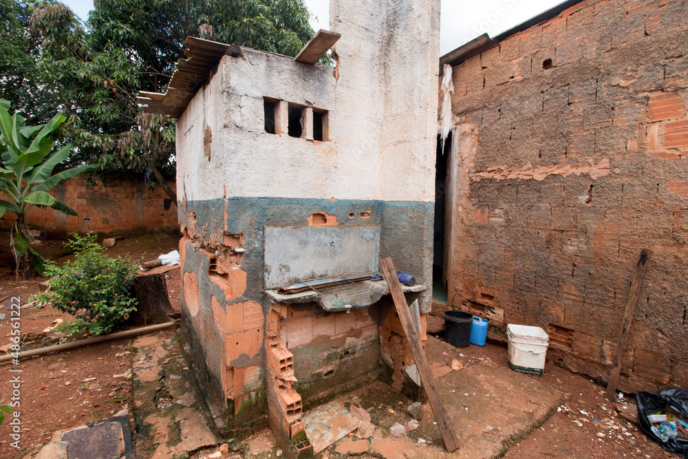 An Crudely Built  Bathroom that is detached from the rest of the house which is common in Brazil.