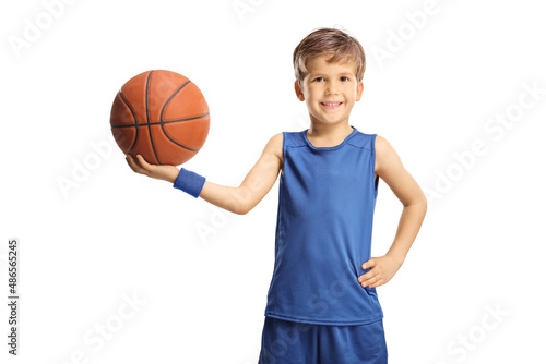 Smiling boy in a blue jersey holding a basketball © Ljupco Smokovski