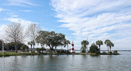 Dramatic skies over Mount Dora's Lighthouse, located at the Port of Mount Dora in Grantham Point Park, Florida, USA. photo