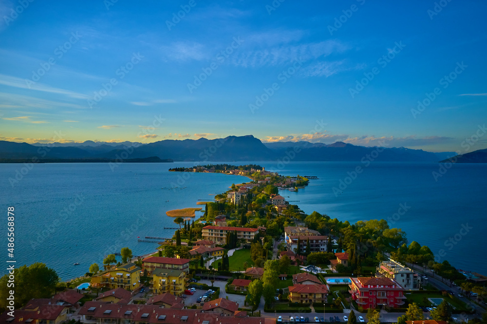 Sirmione, Lake Garda, Italy. Drone view of Sirmione peninsula. Sirmione Lake Garda Italy aerial view. Aerial panorama of Sirmione. Sirmione on Lake Garda drone view. Panorama of Lake Garda.