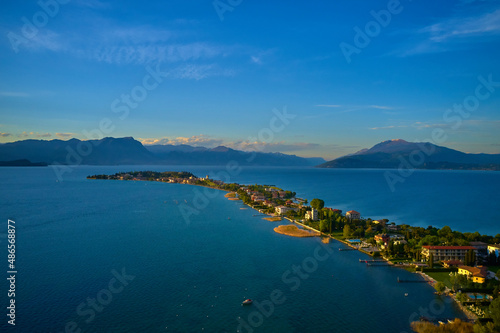 Panorama of Lake Garda. Sirmione, Lake Garda, Italy. Drone view of Sirmione peninsula. Sirmione Lake Garda Italy aerial view. Aerial panorama of Sirmione. Sirmione on Lake Garda drone view.