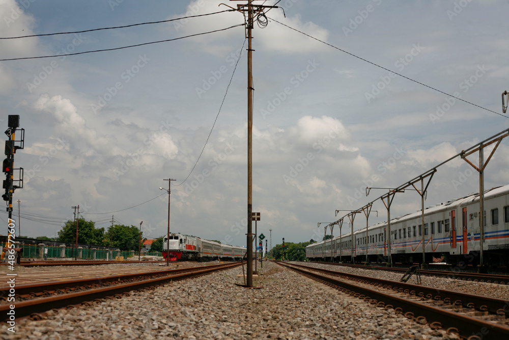 Fototapeta premium Railway station with passanger train in java Indonesia