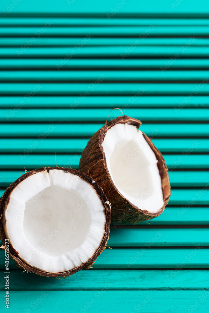 Fresh coconut half wooden background. Fresh coconut half wooden background.