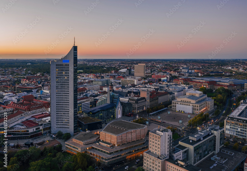 Sunset aerial Leipzig (Saxony, Germany) cityscape: Opera house, Leipzig University, City-Hochhaus skyscraper and Gewandhaus