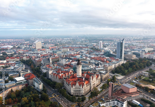 Leipzig, Saxony, Germany - October 2021: Aerial view on Stadt Leipzig (New Town Hall) and beautiful Leipzig morning cityscape 