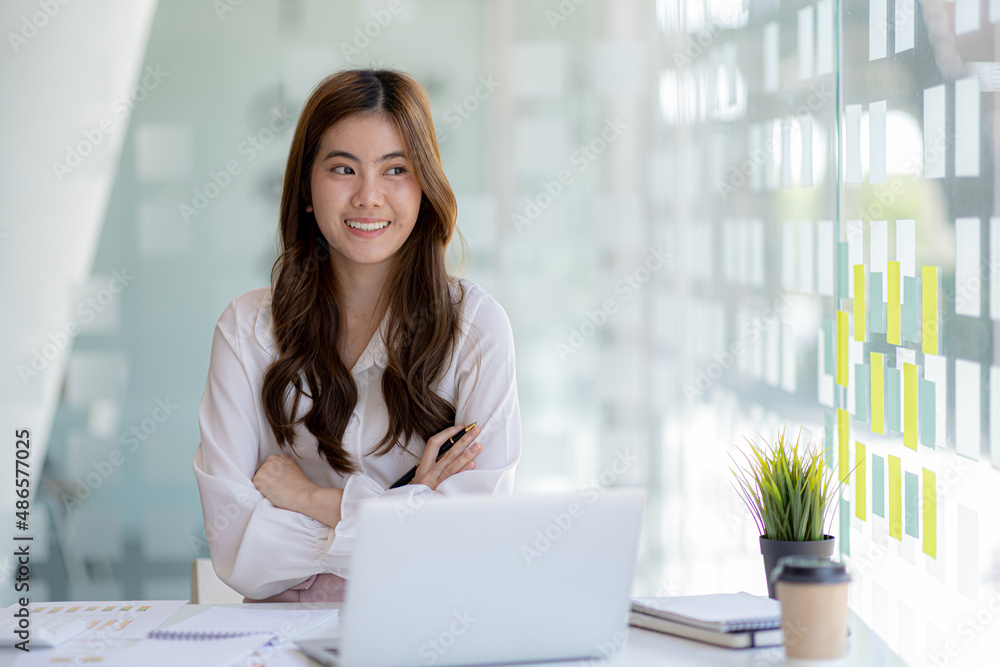 Beautiful Asian woman is a businesswoman who leads a new generation of startups, a woman who runs and manages a business plan to build confidence and stability in business, woman-led business concept. Beautiful Asian woman is a businesswoman who leads a new generation of startups, a woman who runs and manages a business plan to build confidence and stability in business, woman-led business concept.