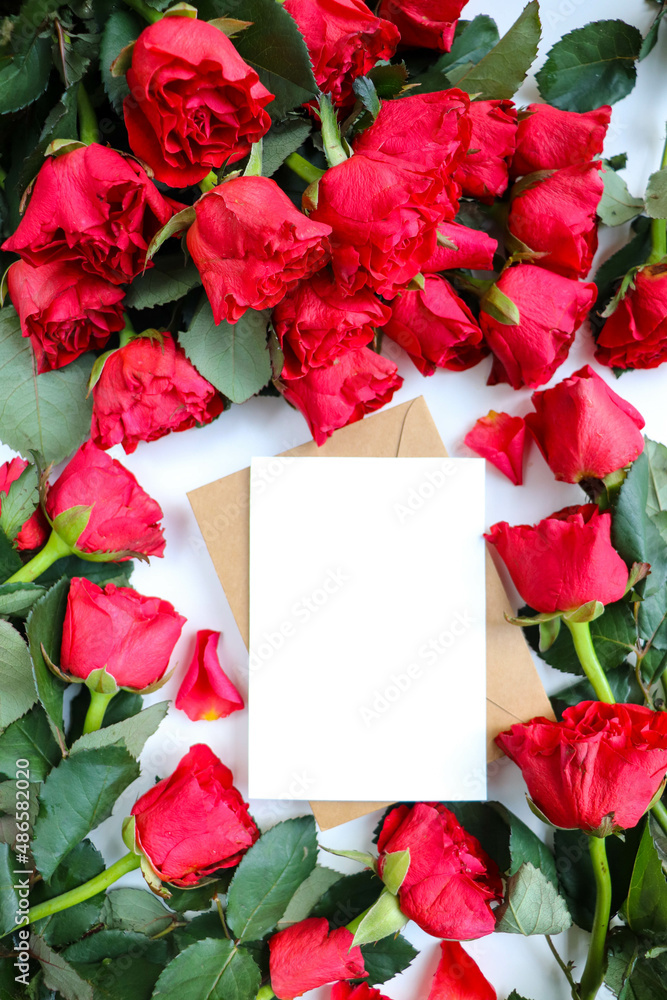 Fototapeta greeting card design. rose bouquet and gift box. space for text. invitation. congratulation
