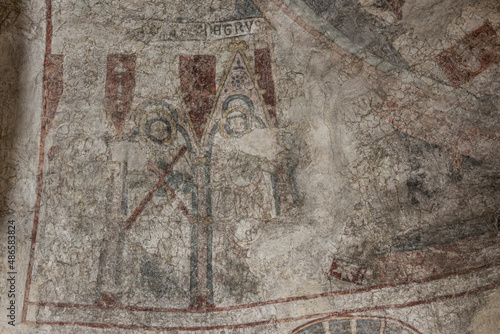 The apostles Peter and Andrew on an ancient medieval mural in the apse of the Church in Skurup