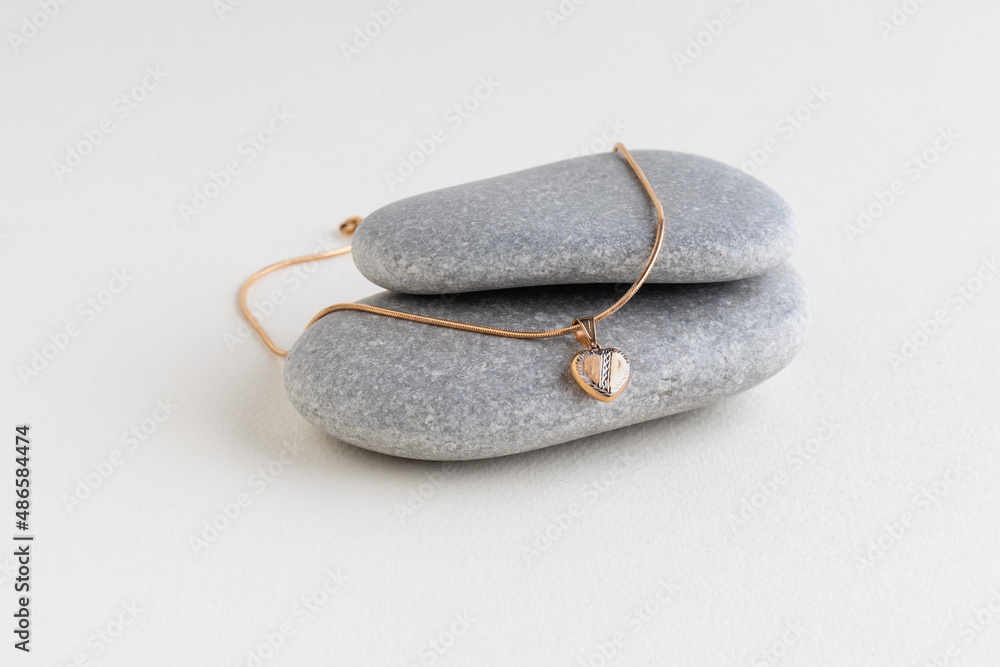 White pearls on a gray stone White pearls on a gray stone