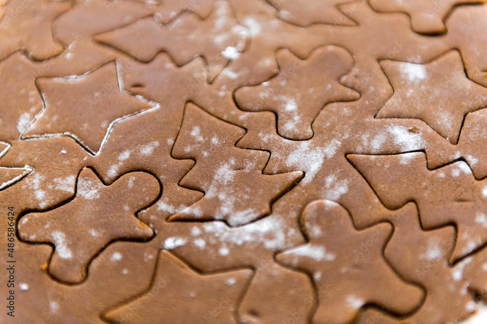 Making Christmas cutout gingerbread cookies Making Christmas cutout gingerbread cookies