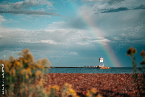 A rainbow over a lighthouse on the north shore of Lake Superior