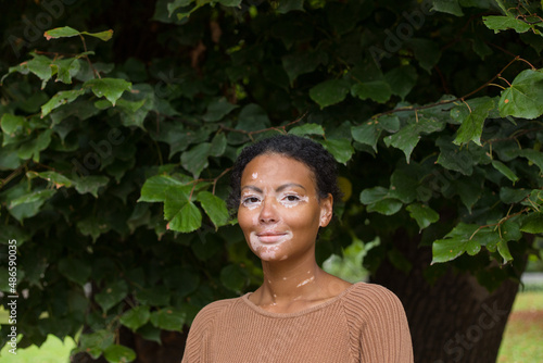 the girl in the leaves
 photo