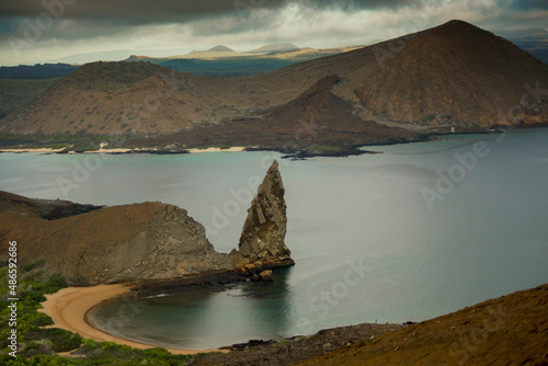 The iconic Pinnacle Rock in the volcanic Bartolome Island, Galapagos Archipelago, under a stormy weather