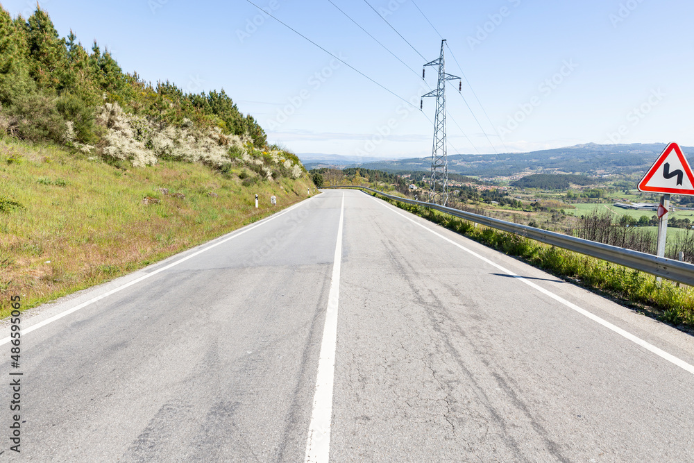 N2 Km23 paved road (EN2 - Estrada Nacional 2) next to Oura, Municipality of Chaves, district of Vila Real, Portugal - April 2019 N2 Km23 paved road (EN2 - Estrada Nacional 2) next to Oura, Municipality of Chaves, district of Vila Real, Portugal - April 2019