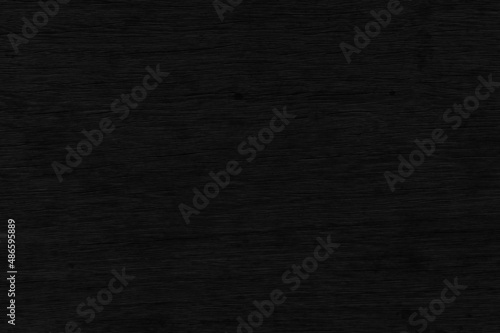 Black wood wall texture for background.