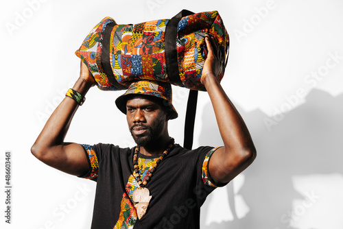 Confident man in traditional african clothes photo