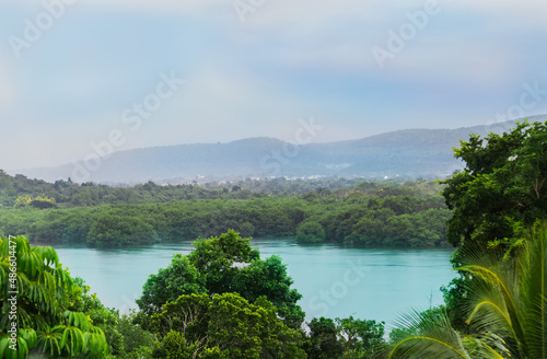 Holguin Province, Cuba island, great amazing landscape scenery view on salted lake surrounded with mountains on overcast warm day 