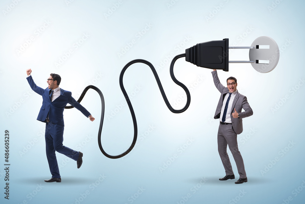 Fototapeta premium Businessman being powered by electric power