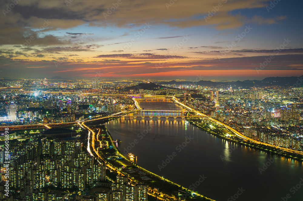 Landscape Seoul city at night and the Han River ,South Korea.And the beautiful sunset 