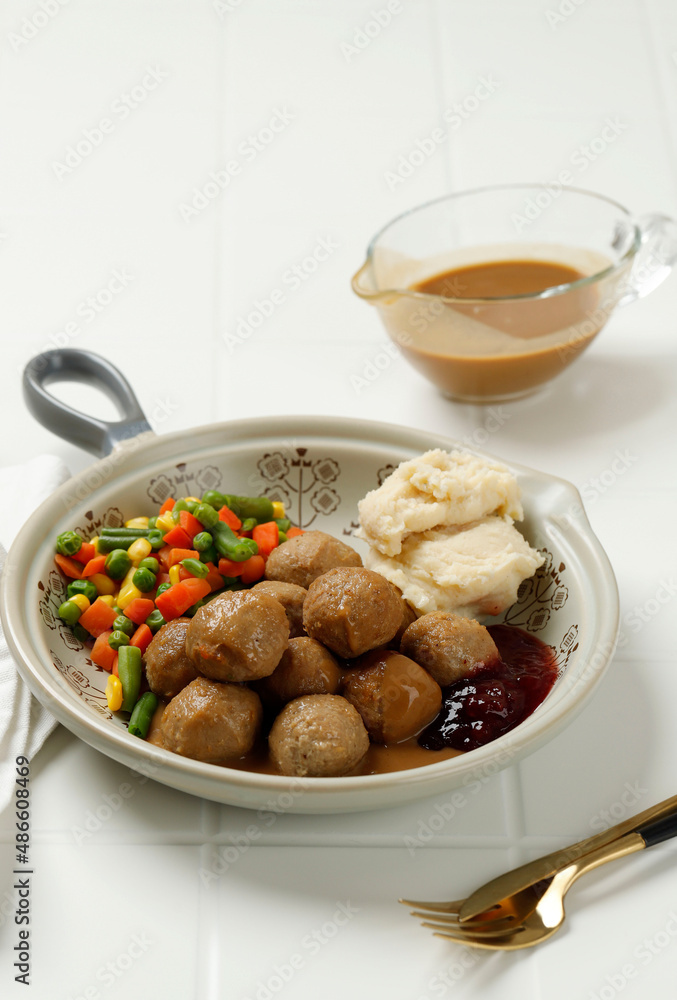 Swedish Meatball with Lingonberry Jam and Brown Mushroom Sauce. Swedish Meatball with Lingonberry Jam and Brown Mushroom Sauce.