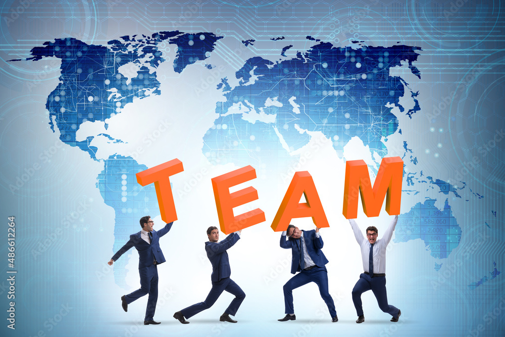 Teamwork concept with people carrying team letters Teamwork concept with people carrying team letters
