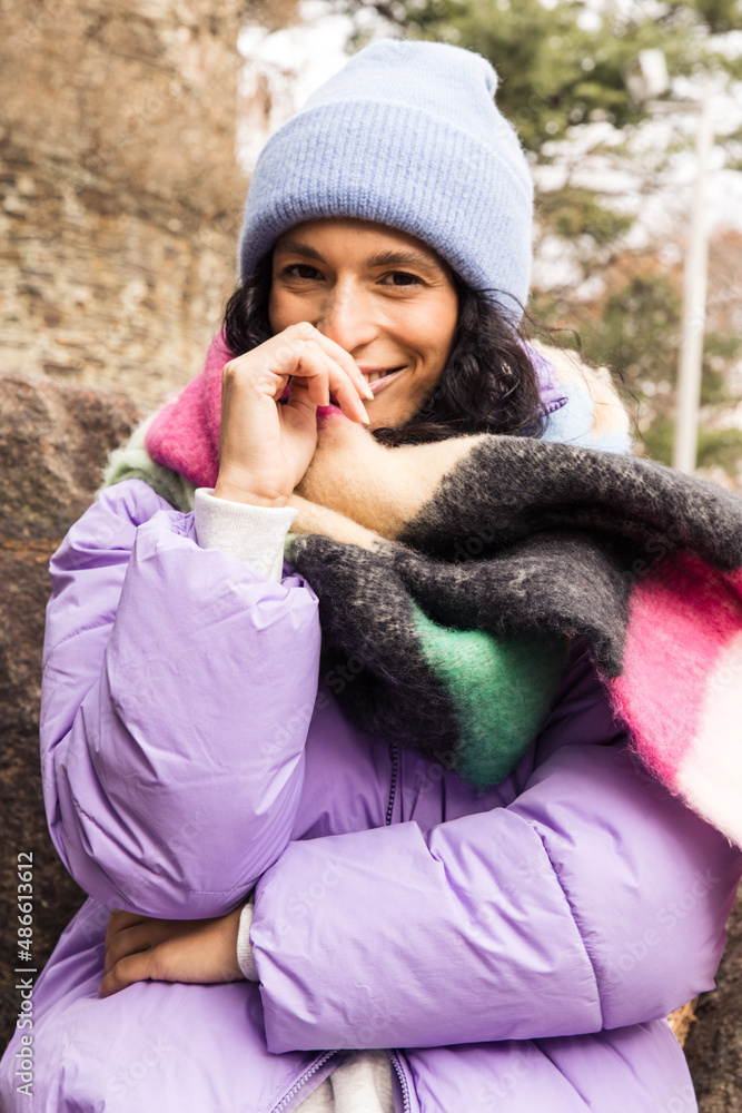 Model wearing winter beanie and puffer Model wearing winter beanie and puffer