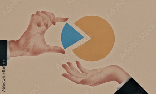 Businessmen holding pie chart