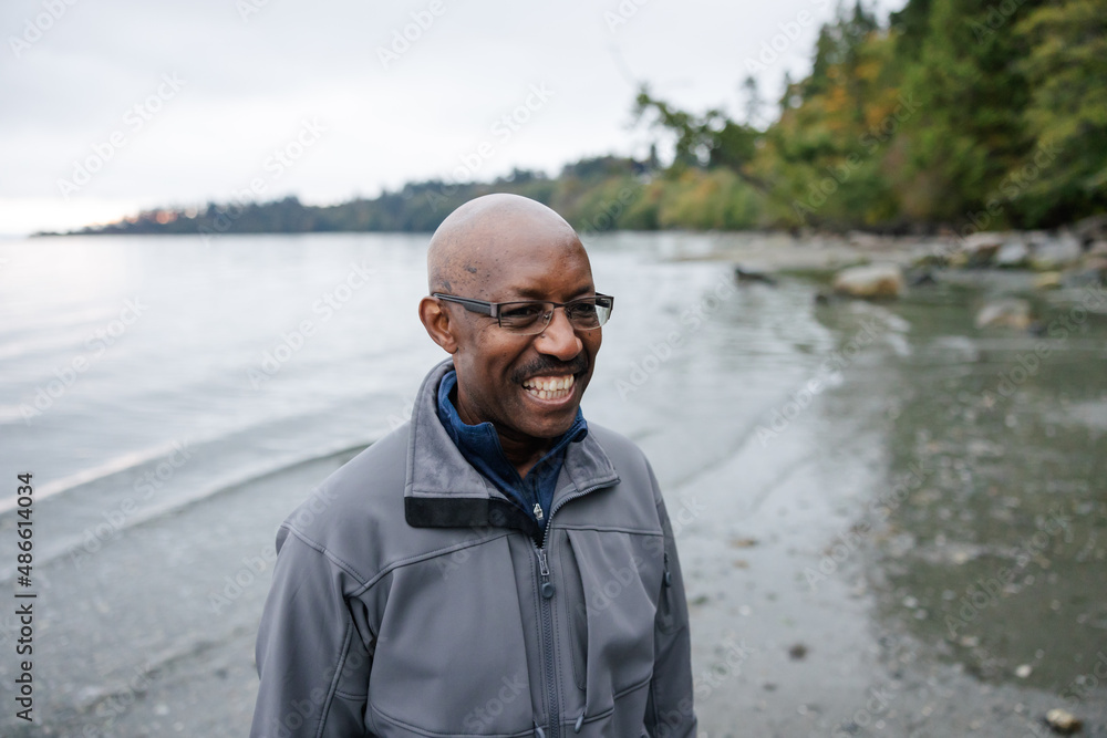 Older man with glasses enjoying being outside. Older man with glasses enjoying being outside.