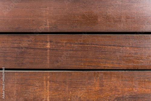 three planks of reddish varnished wood. vector wood background texture