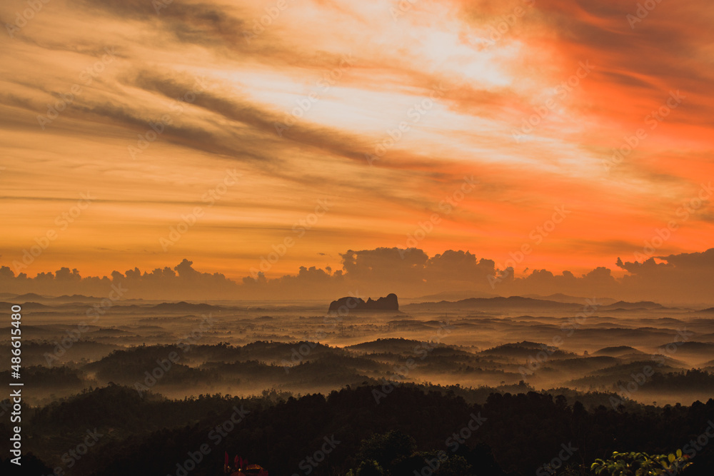 Fototapeta premium cloudy sunrise in the mountains 