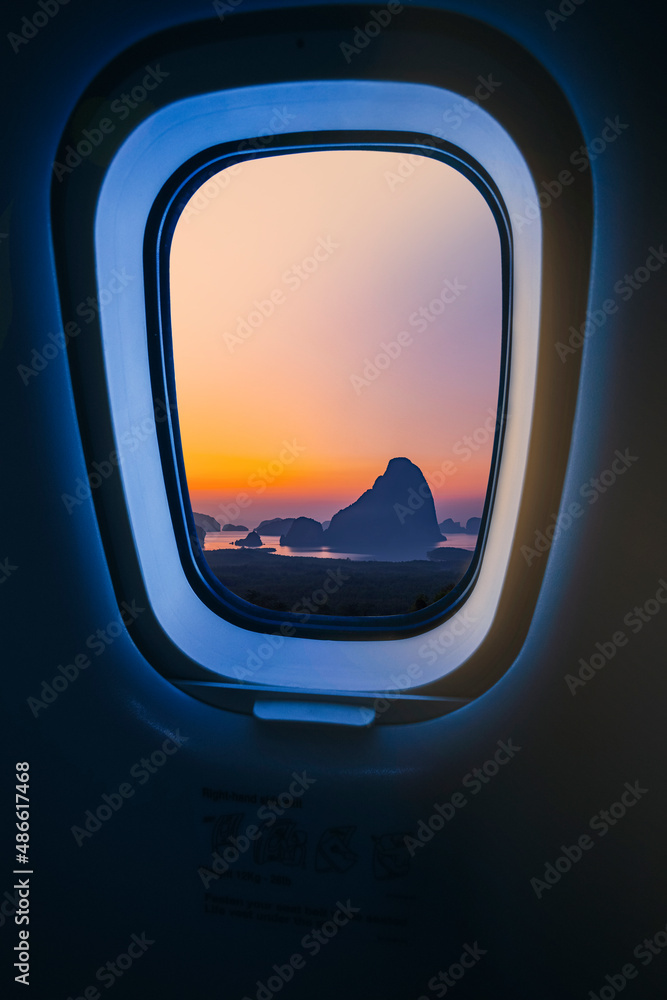 Naklejka premium Concept image of touring and transportation, airplane's window with Samed Nang Shee ariel view in Thailand.