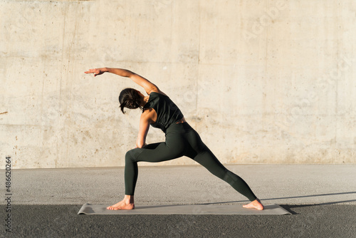 Woman Practicing Yoga Outdoor