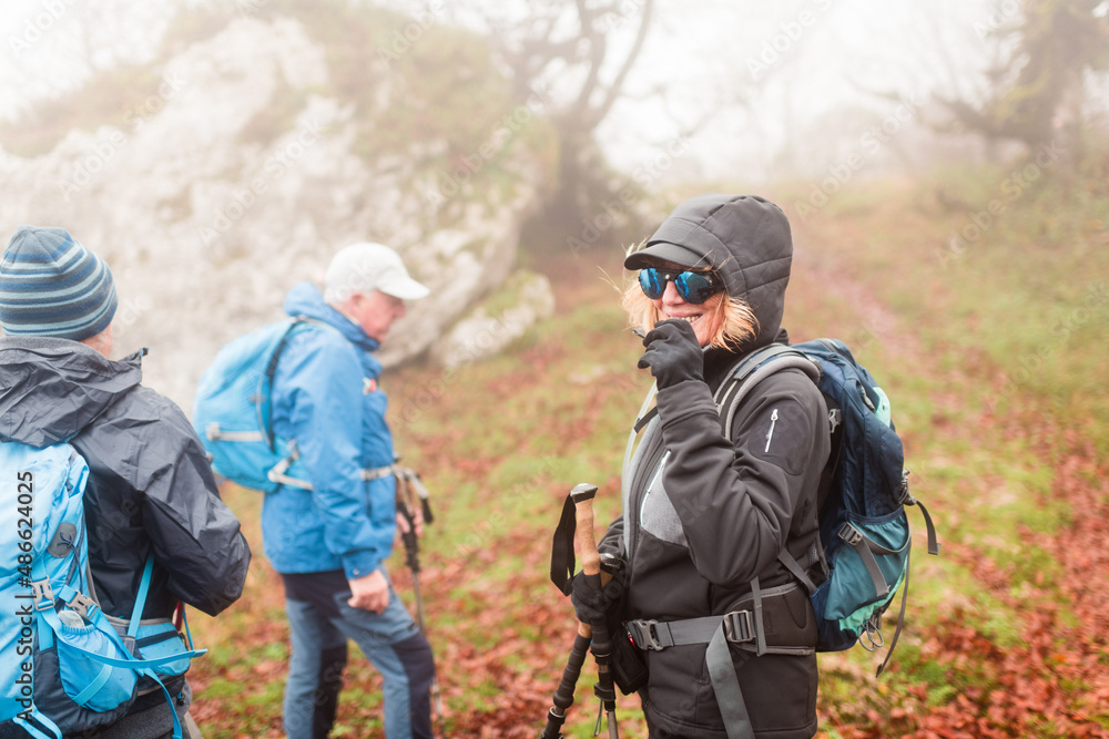 Smiling senior hiker during a break Smiling senior hiker during a break