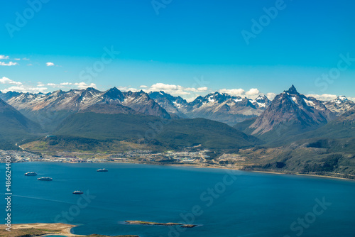 Argentina, Tierra del Fuego, view from the plane on the amazing mountain landscape and the city of Ushuaia